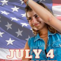 Woman in denim dancing on a boat, celebrating the 4th of July with an American flag waving in the background.